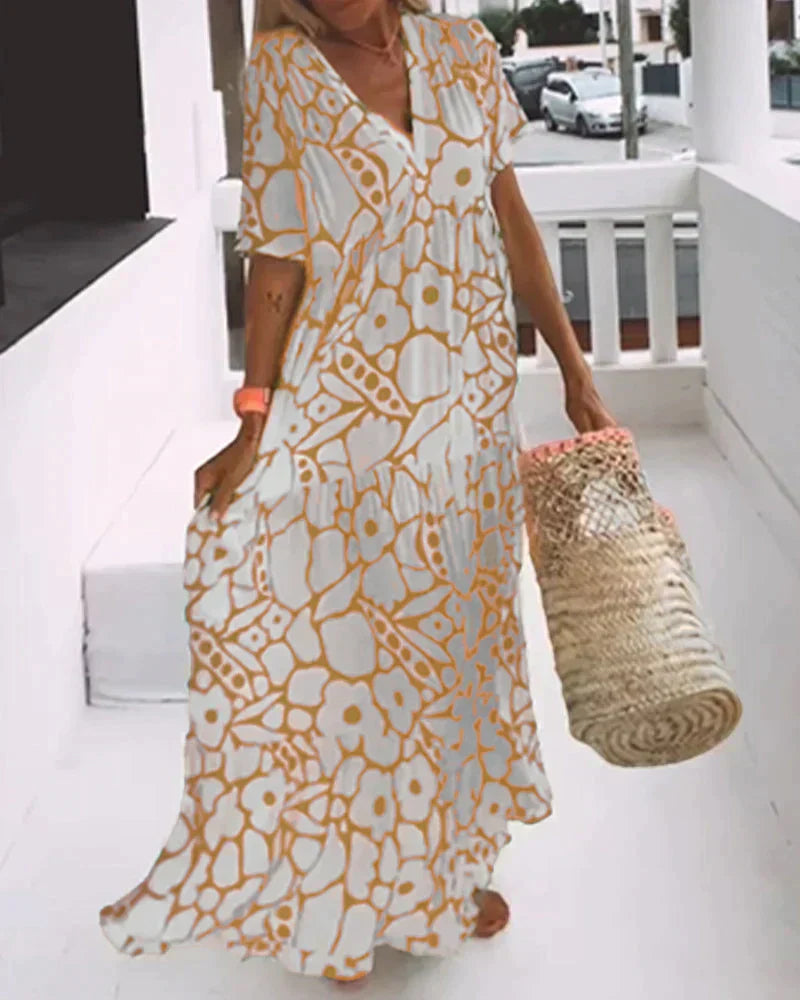 Juni™️ | Ibiza-stil klänning med bohemiskt blomtryck