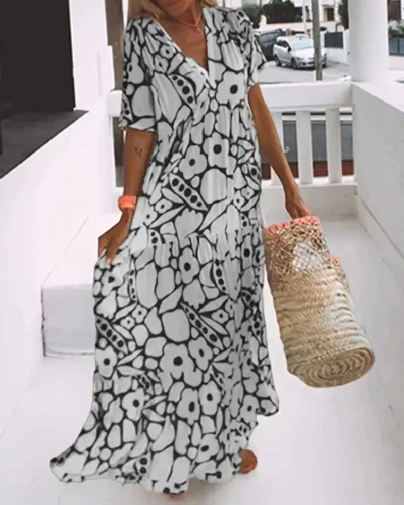 Juni™️ | Ibiza-stil klänning med bohemiskt blomtryck